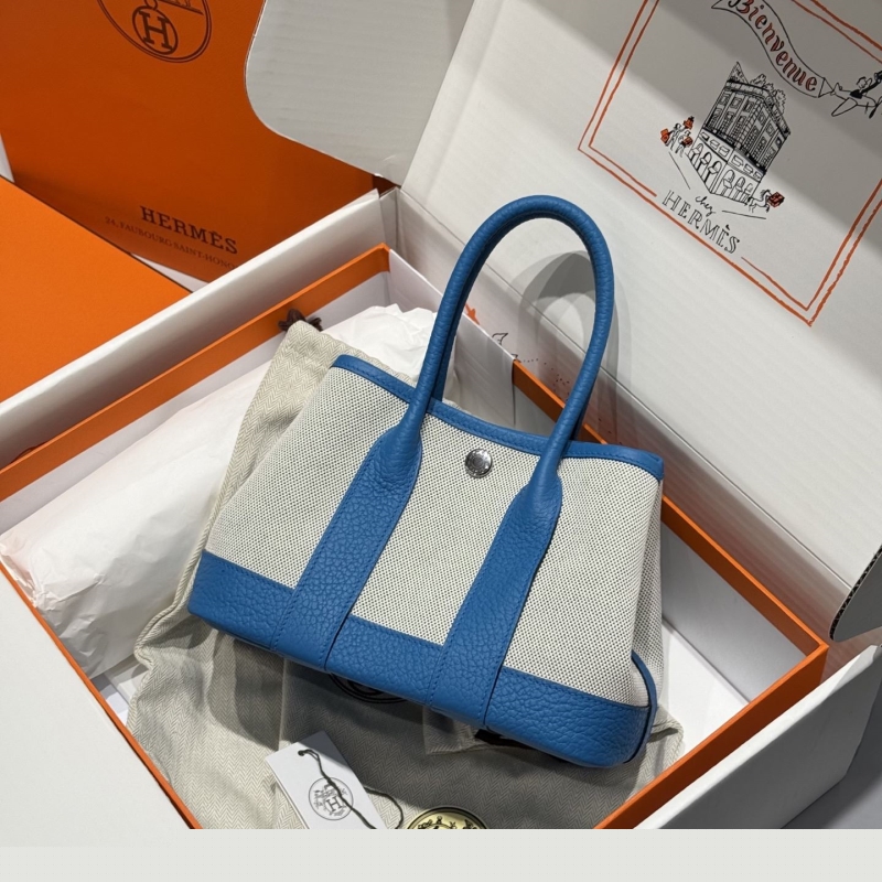 H**mes shopping bags